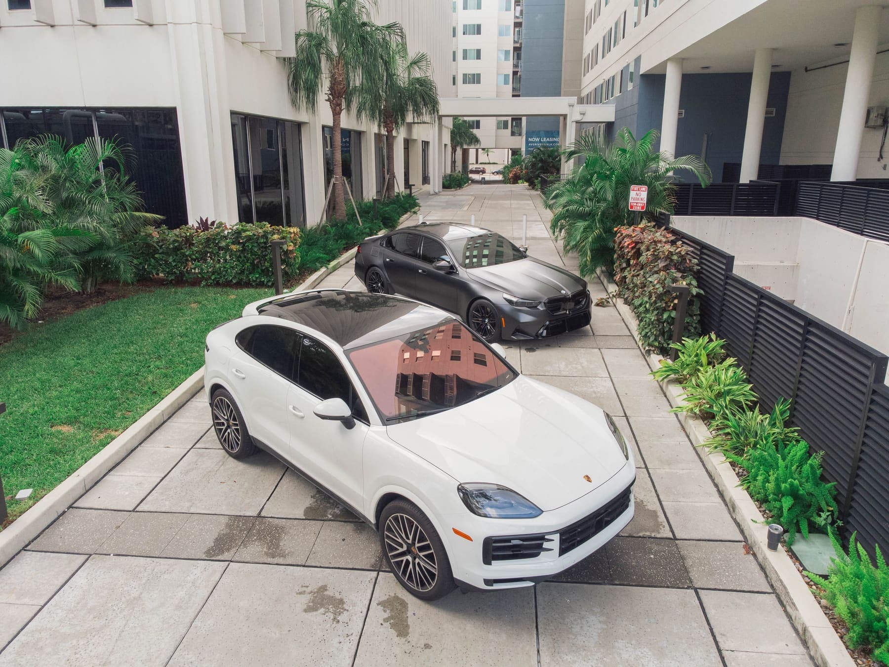 A Porsche Cayenne and BMW M5 detailed in downtown Tampa